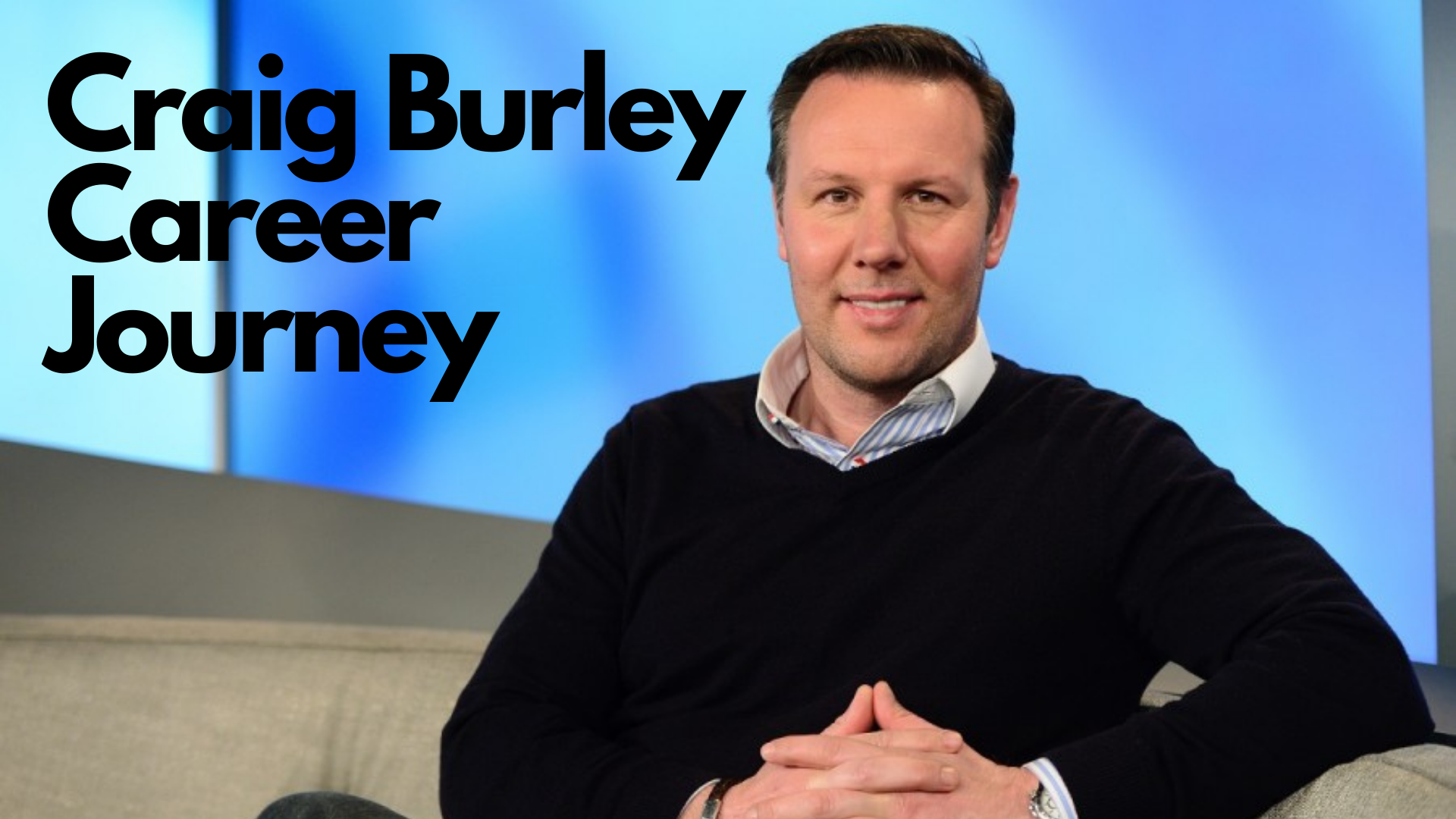 Craig Burley smiling while sitting on the couch