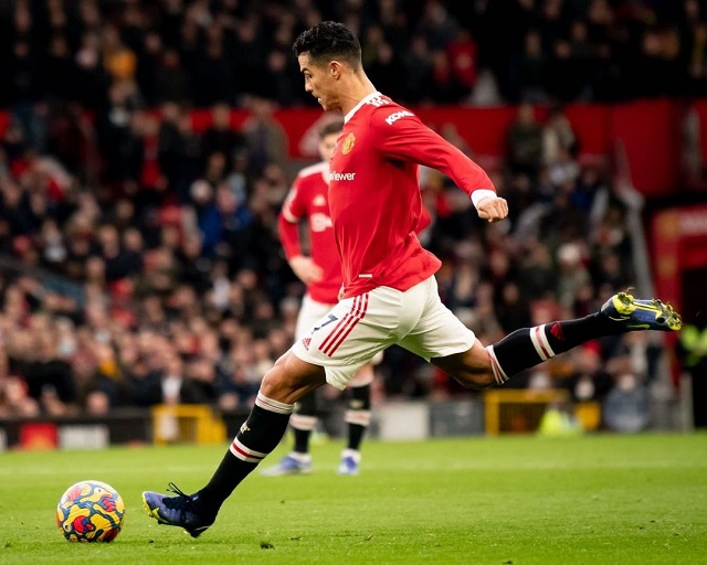 Cristiano Ronaldo about to kick a ball during a play for Manchester United