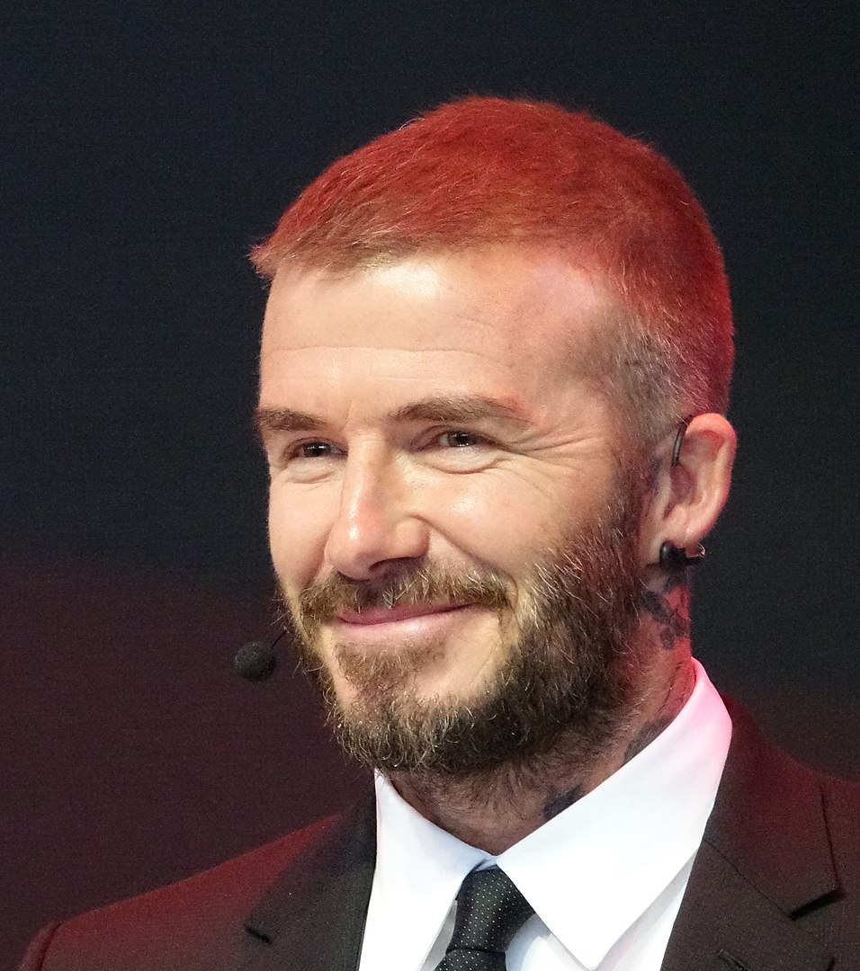 David Beckham In Paris wearing black coat