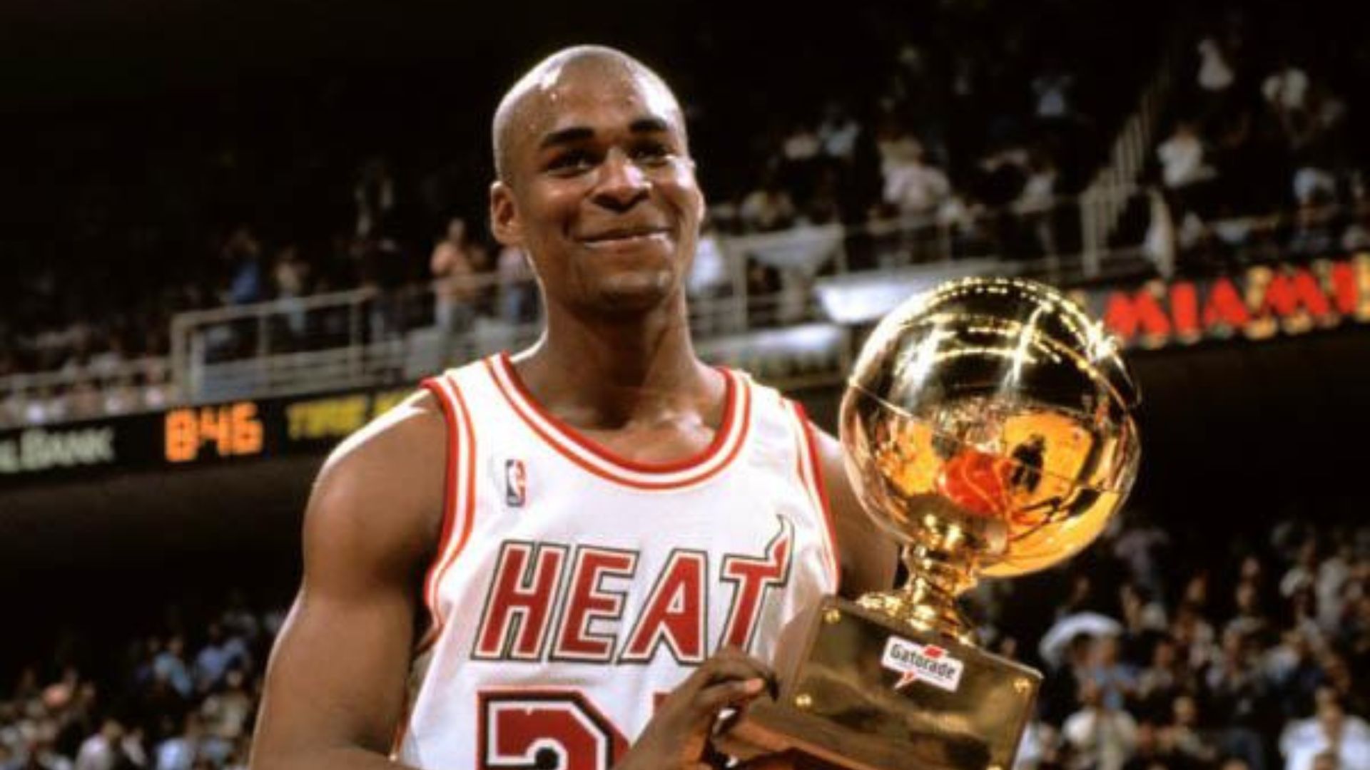 Harold Miner Posing With trophy