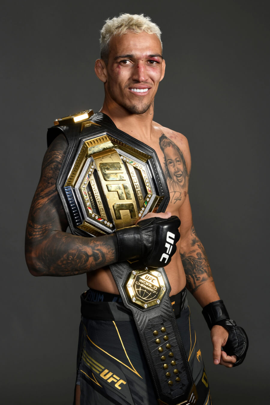 Charles Oliveira Holding UFC Belt