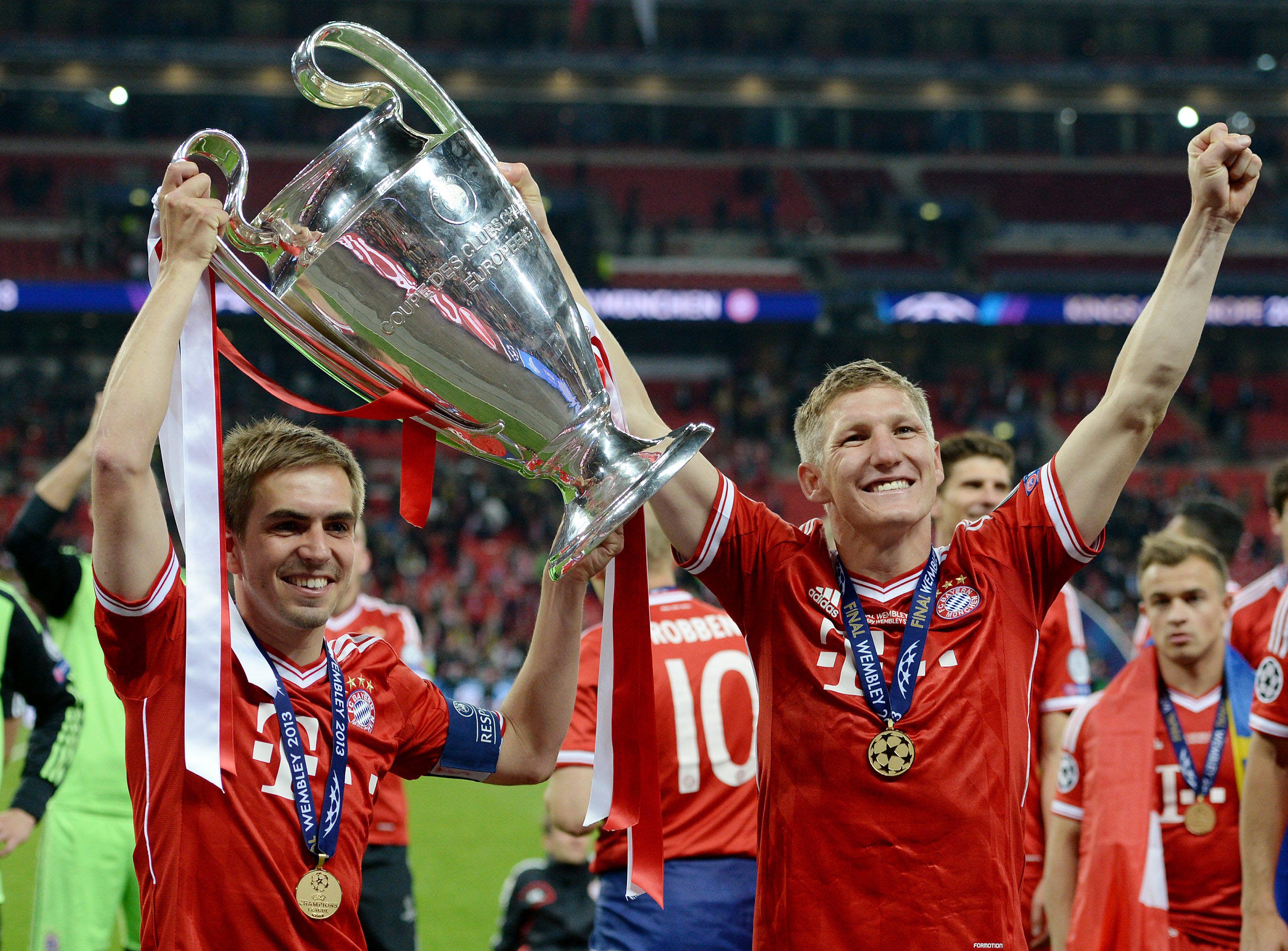 Bastian Schweinsteiger Celebrating And Holding Trophy